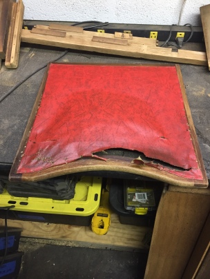 The original fabric had been replaced with this beautiful red vinyl.
